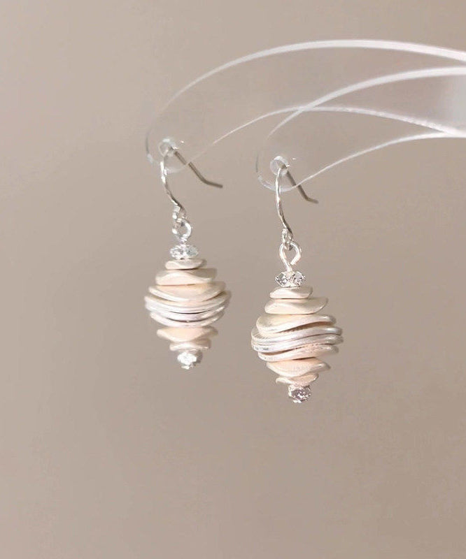 Boucles d'oreilles pendantes femme forme conque design original 2
