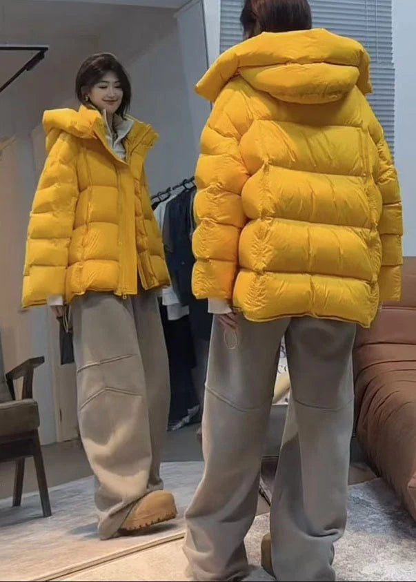 Veste d'hiver pour femme à capuche et coupe ample 1